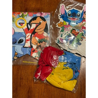 NUEVO Kit de decoraciones de fiesta Disney Lilo & Stitch globos pancarta y pegatinas niños Foto 1 de 4