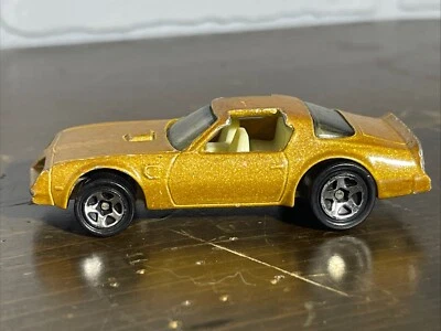 Pontiac Trans Am T Tops dorado 1:64 Mattel Inc China suelto Hot Wheels 1977 vintage Foto 1 de 4