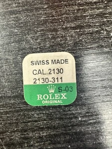 Original Rolex Mainspring Cal. 2130 Parte 311 - NOS - en paquete sellado de fábrica - Imagen 1 de 2