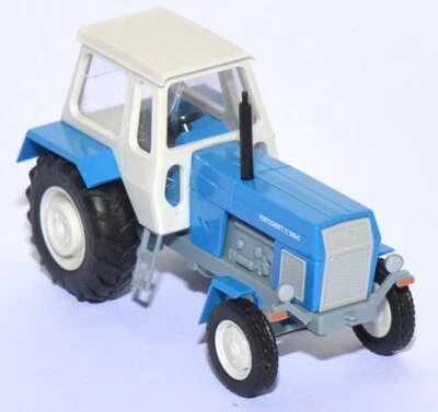 Scaletta H0 M: 1:87 BUSCH 42800 Trattore Fortschritt ZT 300 E In Blu Nuovo OVP - Immagine 1 di 2