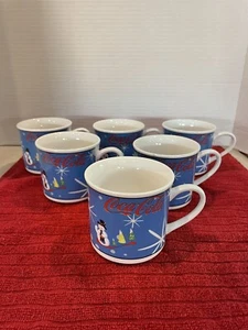 The Coca Cola Co. Pupazzo di neve che ride set di sei tazze natalizie fuori produzione alte 3" - Foto 1 di 5