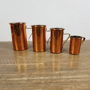 Juego de 4 tazas medidoras apilables vintage de cobre latón - Imagen 1 de 14