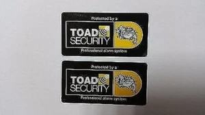 2 x TOAD AI606 CAR ALARM REPLACEMENT WINDOW GLASS STICKERS. NEW RANGE - Picture 1 of 1