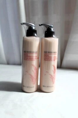 Juego de 2 lociones limpiadoras faciales brillantes con agua de arroz The Face Shop 6,7 fl. Oz. FS Foto 1 de 4
