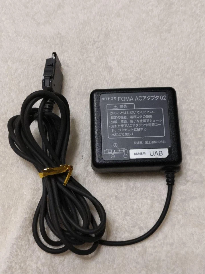 NTT docomo FOMA AC Adapter 02 Charger Tested - Image 1 of 1