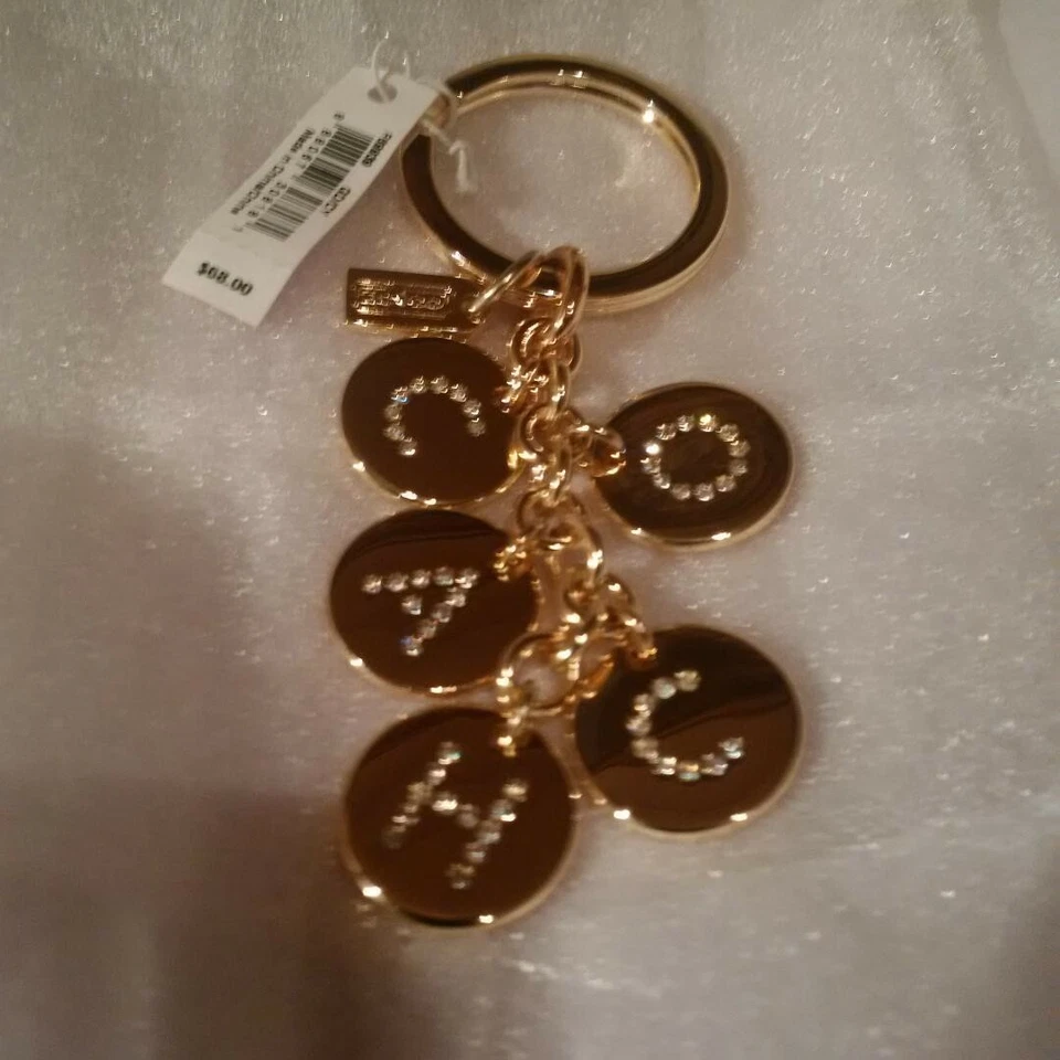 NEW Coach Keychain Gold w/ Crystal Rhinestone Letters (w/ Tags in Coach polybag) - Image 1 of 1