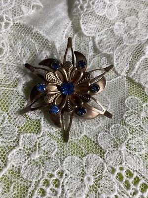 Vintage Gold Tone Blue Rhinestone Flower Brooch Pin Jewelry XE-21 - Image 1 of 4
