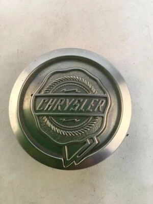 Tapa central de rueda plateada 99-10 Chrysler Sebring 300 Pacifica OEM 18331 CHR85 Foto 1 de 4