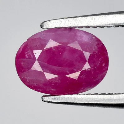 💎 0.79ct 6.5x4.7mm Oval Natural Purplish Red Ruby - Heated, Burma Gemstone - Image 1 of 4