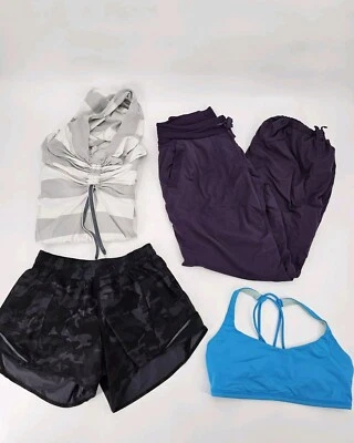 Lote de 4 sujetadores cortos y suéteres multicolores Lululemon para mujer talla 8 VER FOTOS Foto 1 de 4