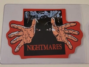 NIGHTMARES 1980er PRISMATIC Prisma AUTOMAT STICKER KARTE GESTANZT sehr selten - Bild 1 von 3