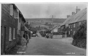 POSTKARTE DORSET CHIDEOCK DORF PFERD UND WAGEN HÜTTEN RPPC - Bild 1 von 2