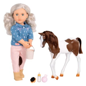 Our Generation - Spielpuppe Yanira mit Reiterhose + Stiefeln 46 cm mit Fohlen - Bild 1 von 4