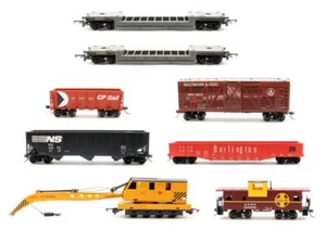 HORNBY/TRI-ANG/BACHMANN 'OO' GAUGE RAKE OF 8 ASSORTED 7X WAGONS & 1X CRANE - Picture 1 of 9