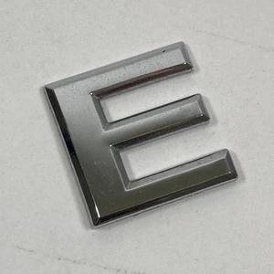 2007-2012 Nissan Sentra Emblem Logo Letter 'E' Badge Rear Tailgate Trunk Chrome - Picture 1 of 9