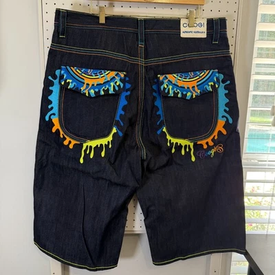 Shorts jeans masculino Coogi 40 azul amarelo botão slime bordado lavagem escura - Imagem 1 de 4