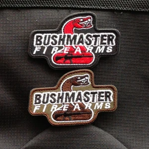 Juego de 2 piezas Bushmaster armas de fuego AK-47 gancho serpiente parche cresta bordado triangular  - Imagen 1 de 8