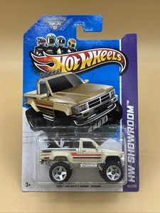 Camioneta Toyota Hot Wheels HW Showroom 1987 1:64 bronceada #165/250 2013 - Imagen 1 de 6