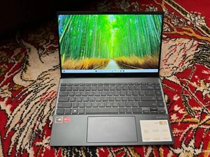 ASUS ZENBOOK 14 UM425QA-EH74 RYZEN 7 5800H 256GB 16GB RAM Win 11 Pro - Bild 1 von 9