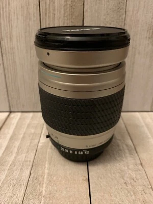 Tokina AF 28-210mm f/4.2-6.5 SLR con tapas delanteras y traseras y estuche Tarion Foto 1 de 4