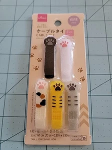 Marca Daiso: Juego de 5 bridas en forma de pata de gato, gancho y bucle, nuevas, envío gratuito - Imagen 1 de 11