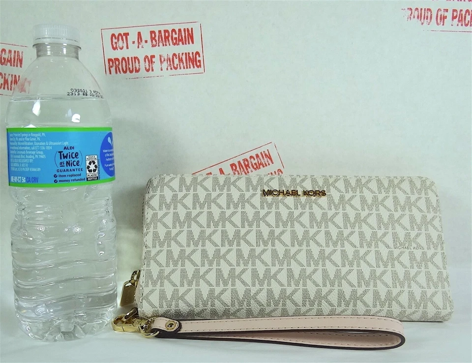 Michael Kors Jet Set Travel Signature PVC Continental Billetera Muñequera Estuche para Teléfono Foto 1 de 1