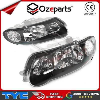 TYC Pair LH+RH Head Light Black Tear Drop For Holden Commodore VX VU SS 00-02 - Image 1 of 4