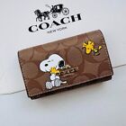 COACH x Peanuts Limited Edition 5 Etui na klucze Snoopy Signature Słodki prezent NOWE