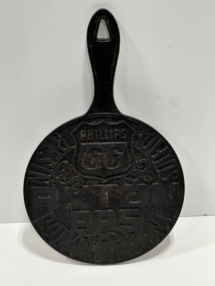 Plato caliente de recuerdo trivet negro en relieve Phillips 66 Ryton PPS de colección Foto 1 de 4