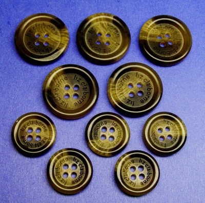 LIZ CLAIBORNE REPLACEMENT BUTTONS PLASTIC INSCRIBED HORN EFFECT , GOOD CONDITION - Image 1 of 4