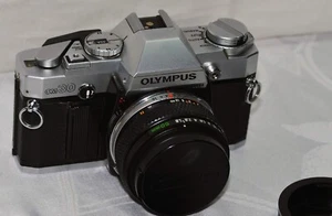 Olympus OM30 con obiettivo Zuiko MC Auto-S 1:1.8 50mm - Imagen 1 de 12