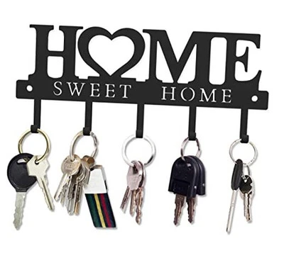  Ganchos organizadores para llaves montados en la pared con tornillos y anclajes  Foto 1 de 4