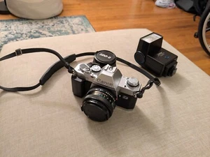 Canon AL-1 QF SLR 35mm Film Camera set (FD 50mm f/1.8, Star-D 28mm f/2.8, Flash) - Picture 1 of 9
