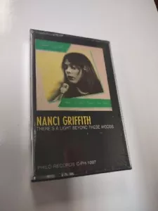 NANCI GRIFFITH- THERES A LIGHT BEYOND THESE WOODS- CASSETTE TAPE - SEALED - Picture 1 of 2