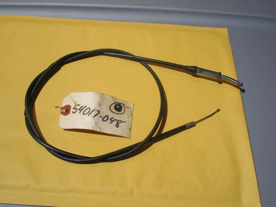 74 75 KAWASAKI F11 1973 NOS cable estrangulador de arranque parte # 54017-048  Foto 1 de 3