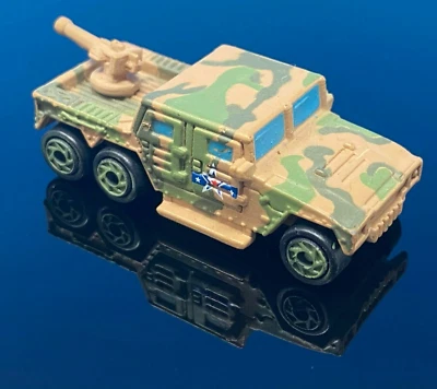 MICRO MÁQUINAS militares TRAXXON RAIDER galoob VERDE Y MARRÓN CAMUFLAJE hummer 1993 Foto 1 de 2