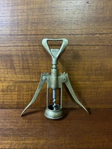 Abridor de botellas de vino sacacorchos alado de latón macizo italiano vintage HECHO EN ITALIA - Imagen 1 de 8