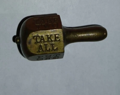 Cracker Jack Lot 390 - metal Put and take Game about an inch tall - heavy Foto 1 de 3