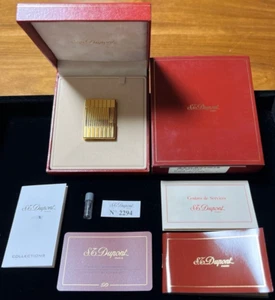Funcionamiento S.T. DUPONT Encendedor Gas Dorado LÍNEA 1 con caja - Imagen 1 de 20