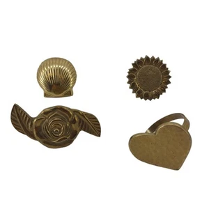 Gemischte Servietten Messing Ringe 4er Set Sonnenblume Rose Herz Muschel Gold - Bild 1 von 8