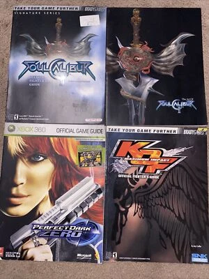 Perfect Dark Zero, Soul Calibur 2 and KOF Strategy Guides and Art of Soul Cal - Image 1 of 4