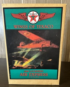1993 Ertl Wings of Texaco 1929 Lockheed Air Express aereo giocattolo coin bank nuovo con scatola - Foto 1 di 3