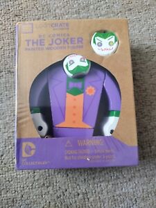 The Joker painted wooden figure
