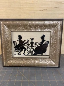 Vintage T. Eaton Co cross stitched picture framed wall hanging Lady And Man Tea - Picture 1 of 4