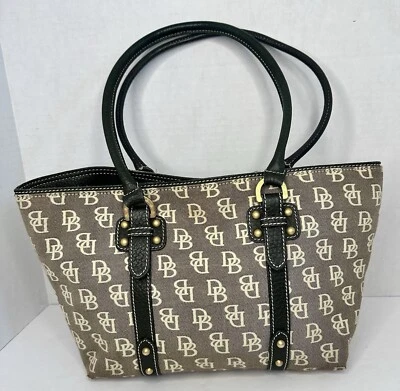 Bolso de Mano Vintage Dooney And Bourne Marrón Firma Lona con Borde de Cuero Foto 1 de 4