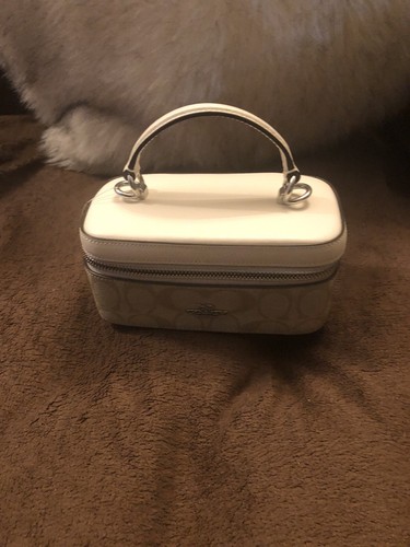 Custodia treno nuova con etichette Coach CJ522 in tela firmata e pelle cachi gesso