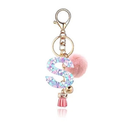 Llavero con letra inicial del alfabeto de resina para mujer bola de piel rosa letra S Foto 1 de 4