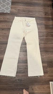 Pantalones de mezclilla blancos de tiro alto con dobladillo crudo pierna ancha Mango MNG - 40 Foto 1 de 4