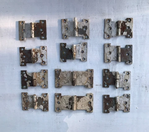 Lot of (12)  salvaged Antique door shutter T hinges in chippy white shabby paint Cover