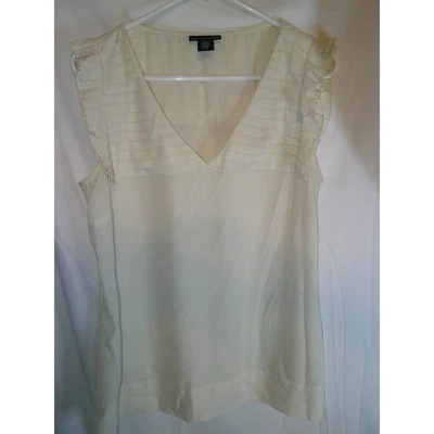 Blusa Apostrophe sin mangas plisada con volantes cuello en V top grande Foto 1 de 3